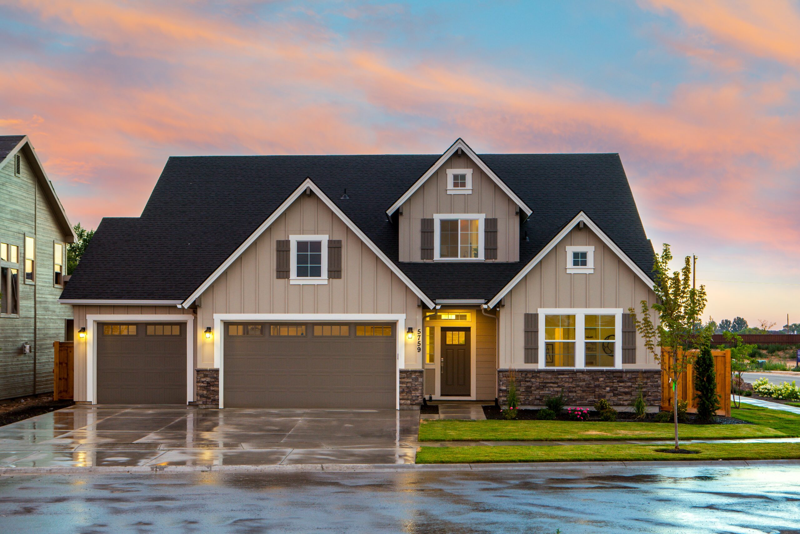 Two story house in Utah with a two-car garage, front yard and backyard