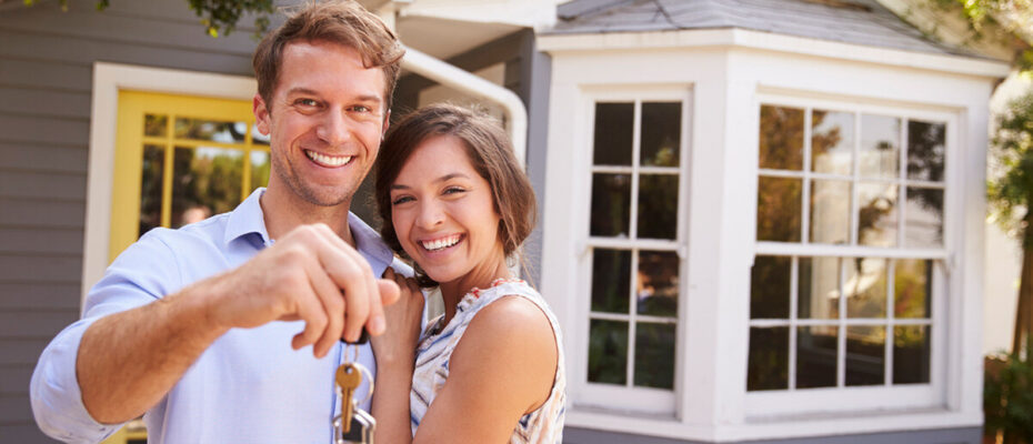 First Time Home Buyers Holding their Keys