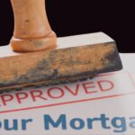 Approved rubber stamp on a mortgage document.