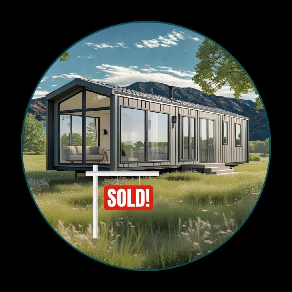 Modern mobile home with sold sign.