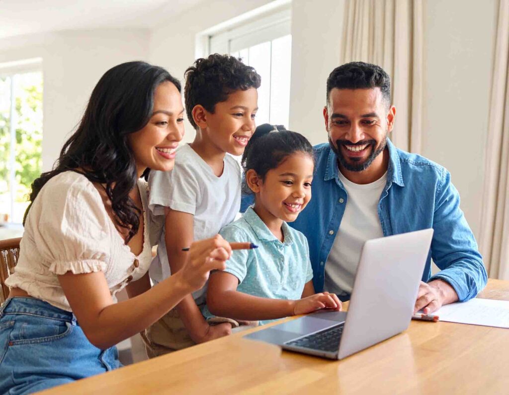 Family using a mortgage qualification calculator to plan their home purchase