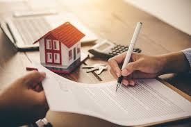 Utah home buyer meeting with a lender to complete mortgage pre approval.